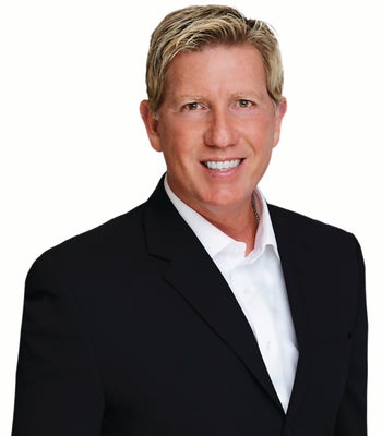 Portrait of Brett Kerley, Realtor®.